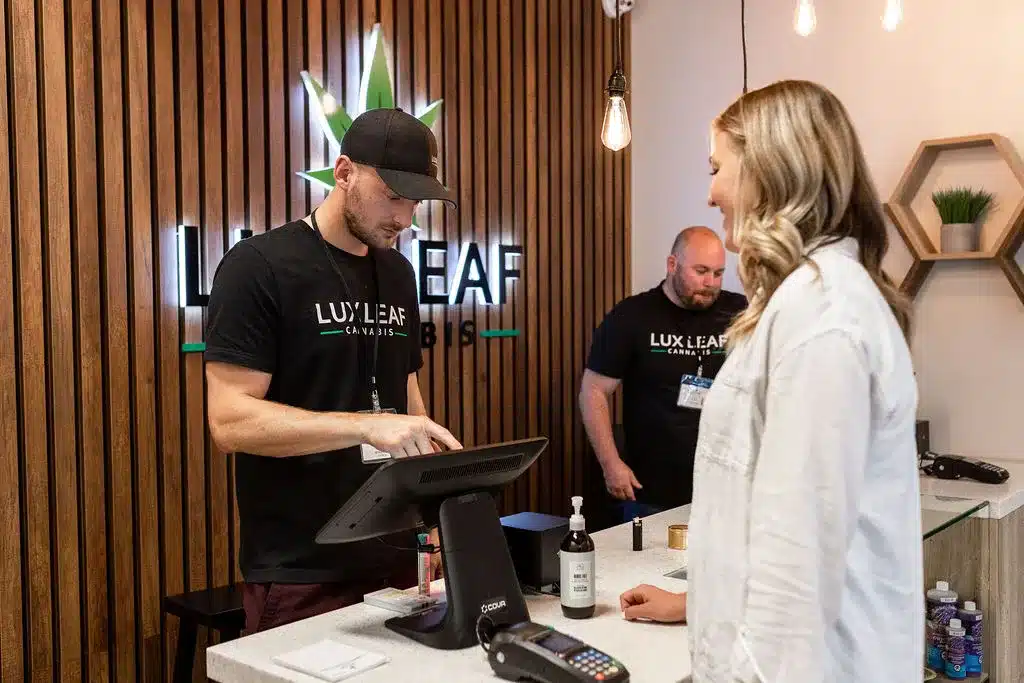 Lux Leaf Staff Serving Customers